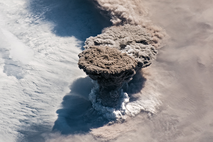 An unexpected series of blasts from a remote volcano in the Kuril Islands sent ash and volcanic gases streaming high over the North Pacific Ocean on June 21, 2019. Credit: NASA.