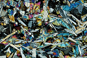 Enhanced picture of a petrographic thin section from a meteorite. Credit: NASA.