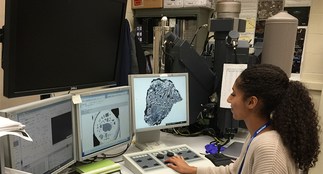 Inside the Electron Microprobe Laboratory: Planetary scientist Jordyn-Marie Dudley 
					(pictured) analyzes Martian meteorites with the Cameca SX100 electron microprobe.