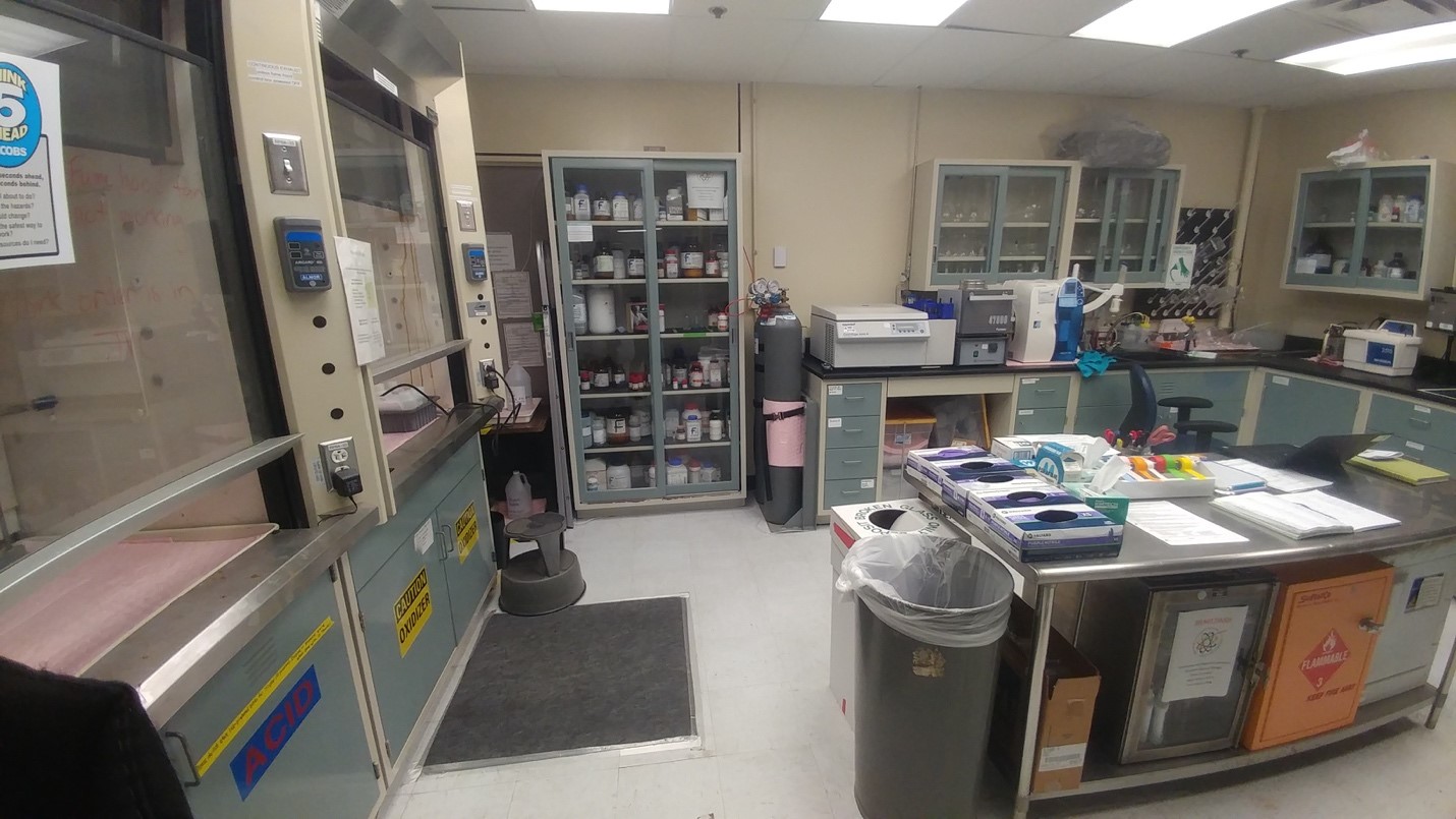 Inside the General Chemistry Laboratory: This is a general purpose laboratory that serves the needs of ARES scientists in Research and Curation. The lab contains a variety of inorganic and organic materials used for sample preparation and synthesis experiments, fume hoods, Milli-Q water, a furnace, a drying oven, centrifuges, and counter space for performing experiments.