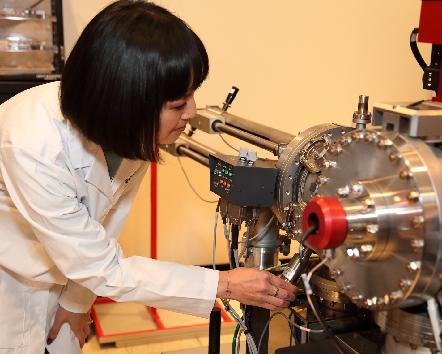 The Cameca NanoSIMS 50L in Action: Research scientist Ann Nguyen adjusts the Cs source position before conducting analyses on precious astromaterials. 
					Spatial resolutions down to 50 nm can be achieved with this primary ion beam source.