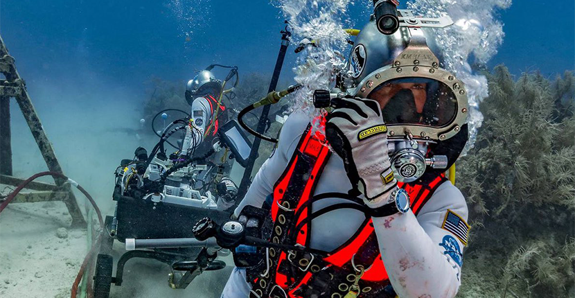 NEEMO Underwater Training: Pictured are two submerged astronauts training for future missions.