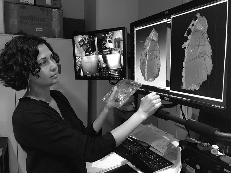 Erika Blumenfeld looking at rock X-ray images