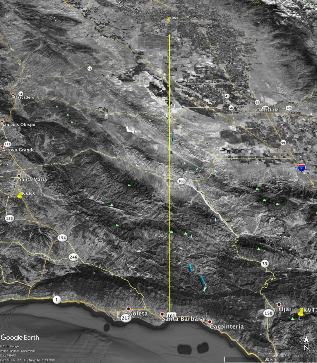 This composite image shows all the radar signatures from falling debris as blue/gray polygons. The approximate ground track is a yellow line. The large scale makes the radar signatures appear small.